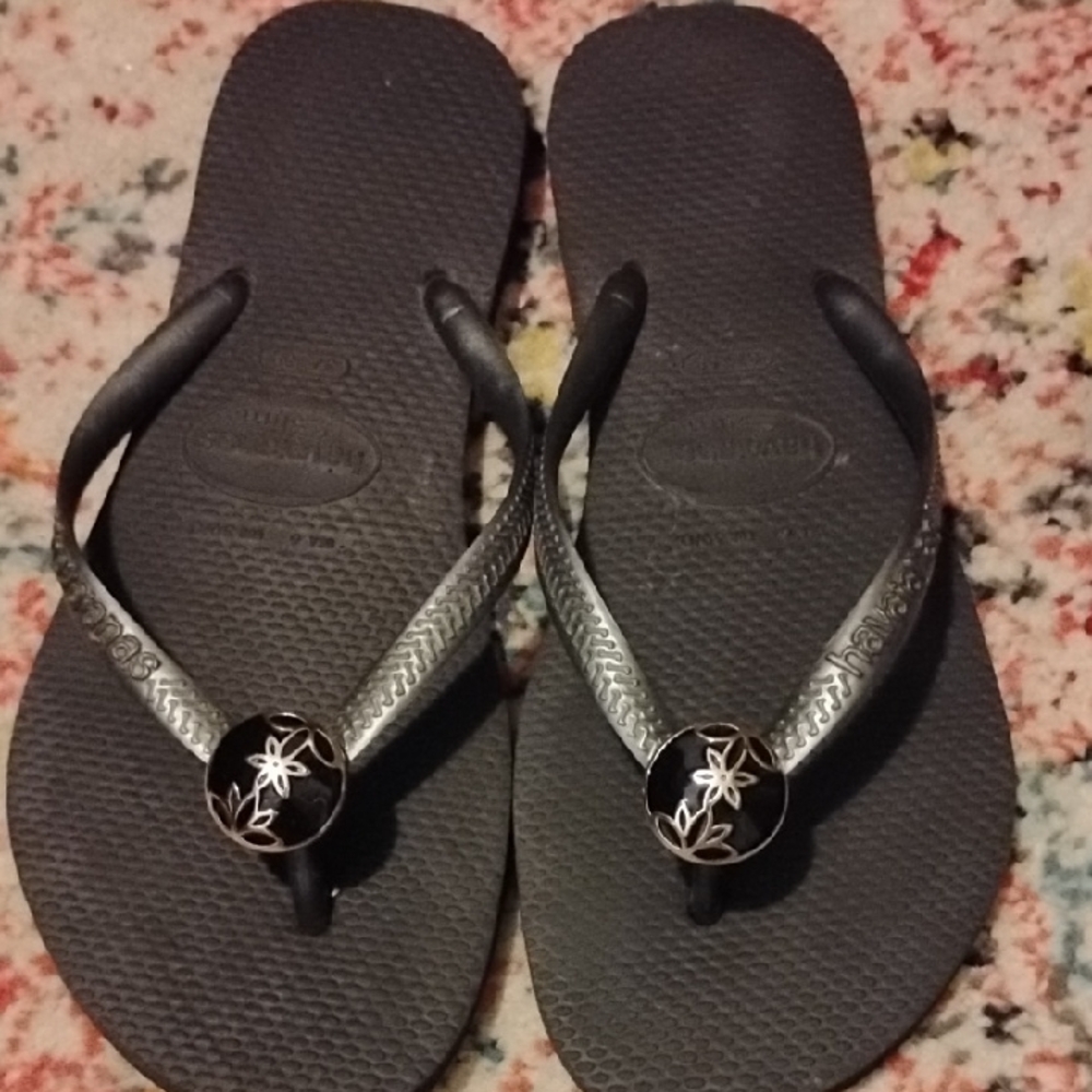 Havaianas Black Flip Flops with Silver Floral Medallion